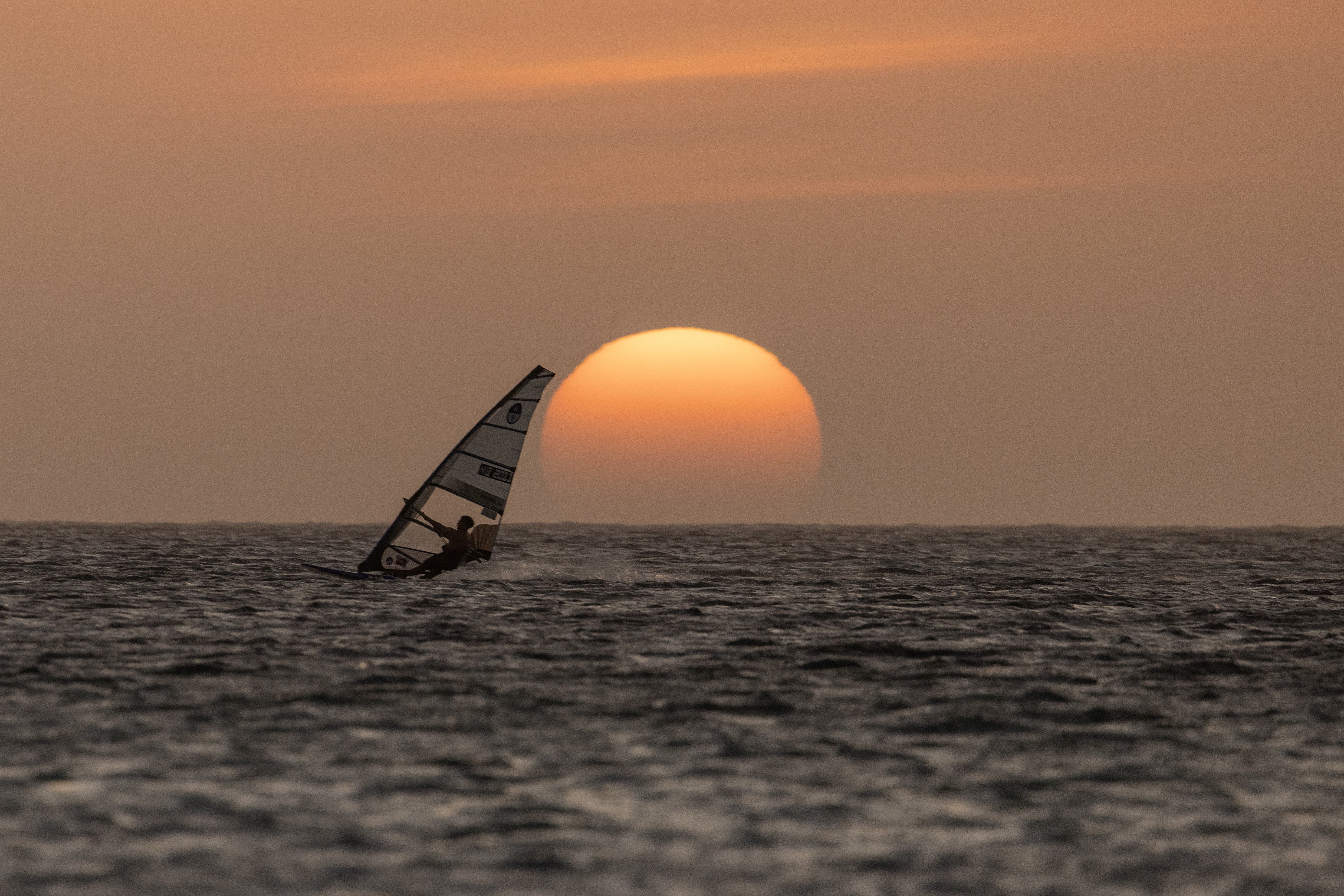 Sunset windsurfing session